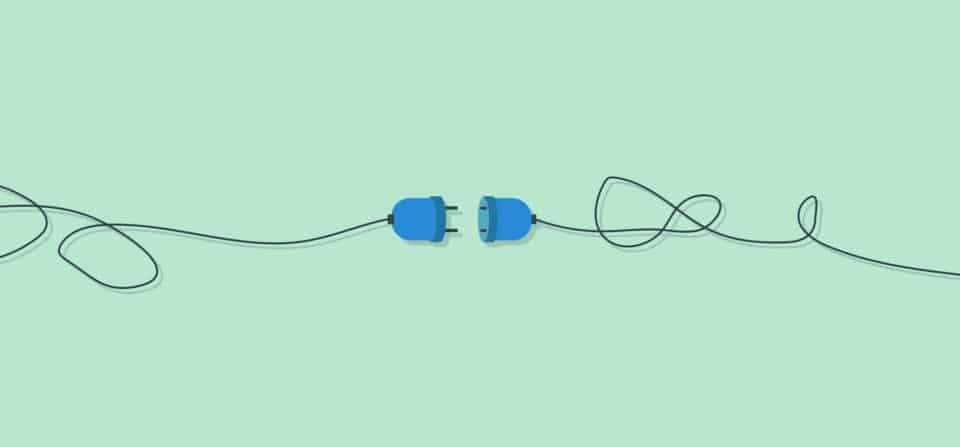 Two electric cables about to be plugged in to each other.