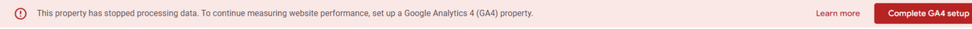 screenshot of Notification alert indicating that a Google Analytics property has stopped processing data with a prompt to complete GA4 setup.