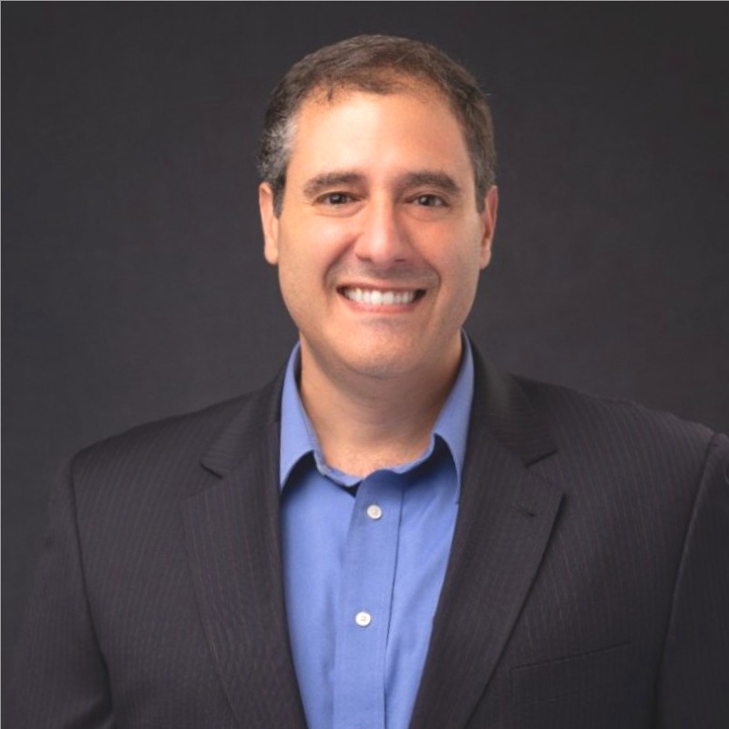 A headshot of Aaron Videtto, Head of Product Management and Client Experience at Anderson Business Advisors